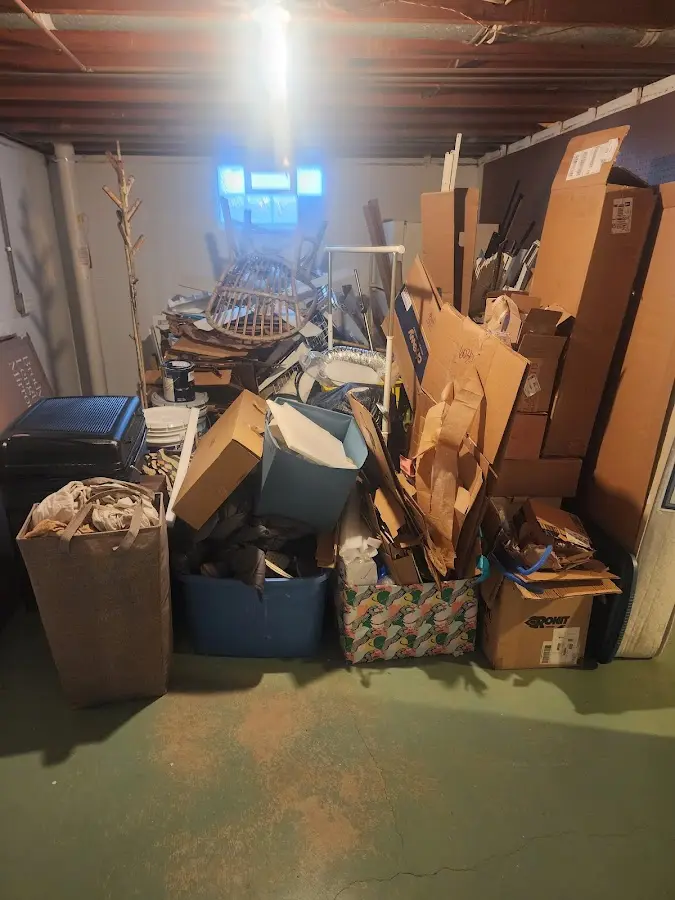 Roll-off dumpster container at job site for 2 Yard Dumpster Rental in Travis Ranch